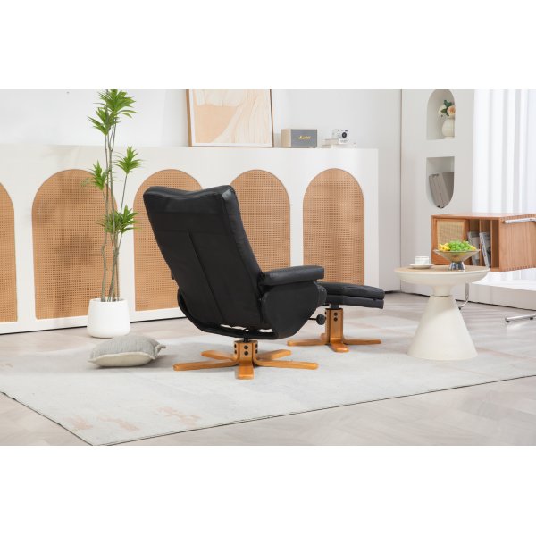Duva Liegesessel mit Fuhocker aus schwarzem PU mit braunen Beinen