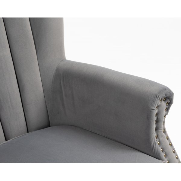 Ohrenklappensessel aus grauem Samt Ohrenklappensessel aus grauem Samt