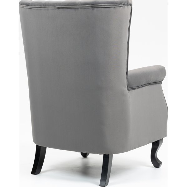 Ohrenklappensessel aus grauem Samt Ohrenklappensessel aus grauem Samt